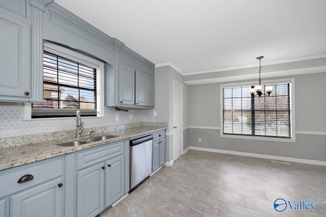 kitchen with sink, dishwasher, tasteful backsplash, a wealth of natural light, and light stone countertops