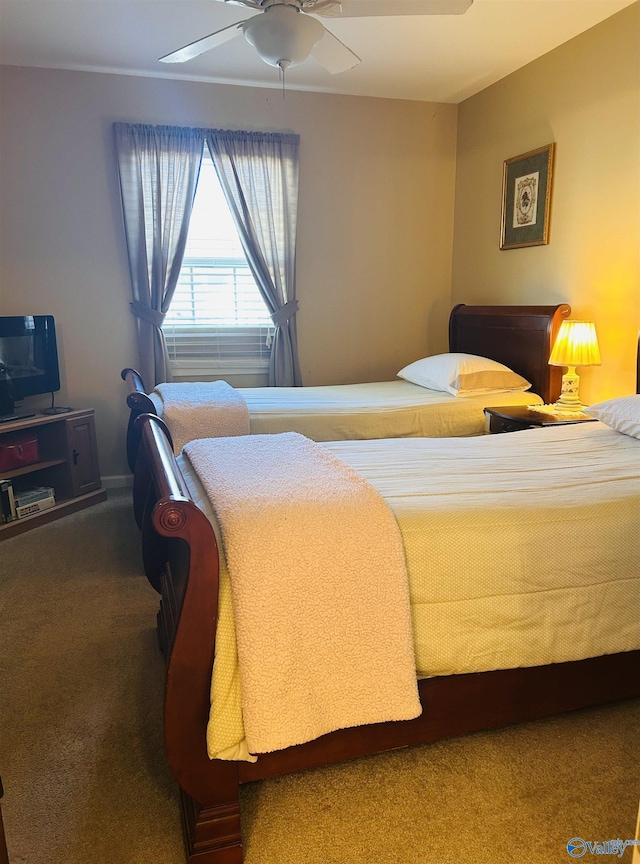 bedroom with carpet and a ceiling fan