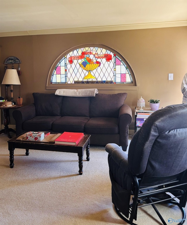 living room featuring carpet, a wealth of natural light, and crown molding