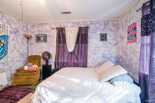 bedroom with crown molding, ceiling fan, and a textured ceiling