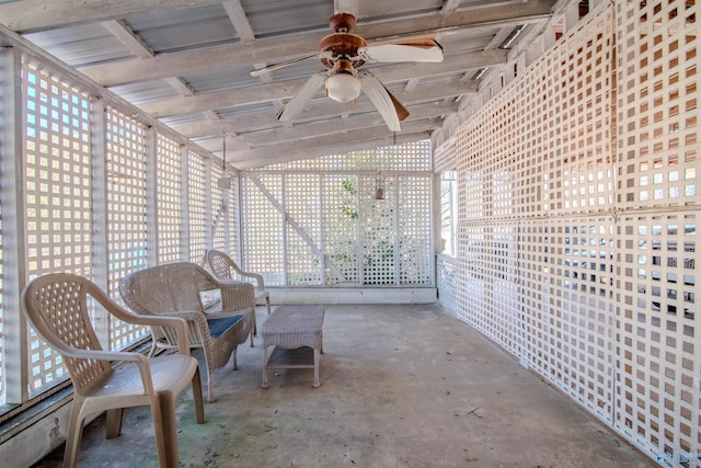 sunroom / solarium featuring vaulted ceiling