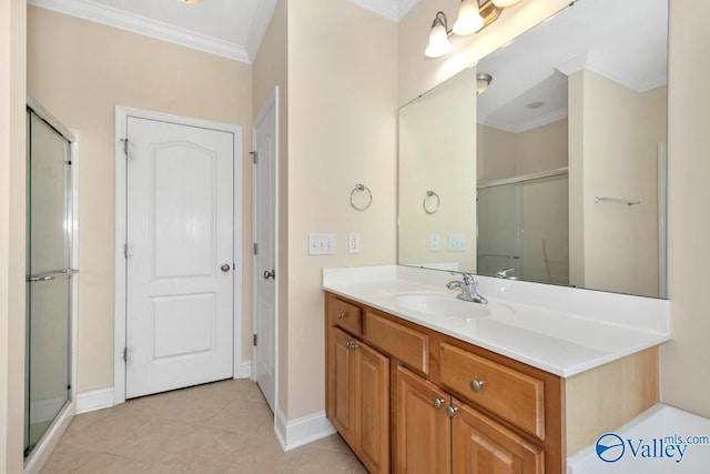 full bathroom with a shower stall, vanity, baseboards, and ornamental molding