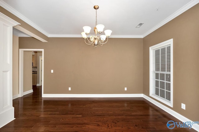 unfurnished room featuring dark wood finished floors, a notable chandelier, ornamental molding, and baseboards