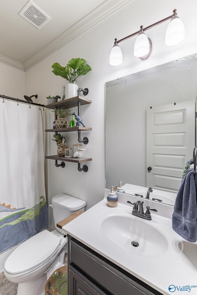 bathroom with visible vents, vanity, toilet, ornamental molding, and a shower with shower curtain