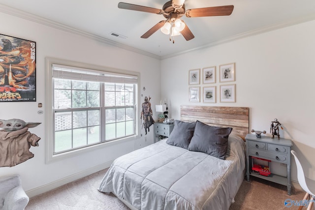 carpeted bedroom with crown molding, baseboards, multiple windows, and visible vents