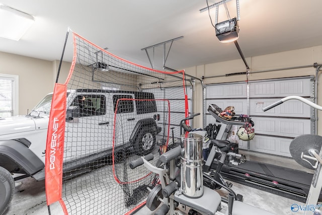 garage featuring a garage door opener