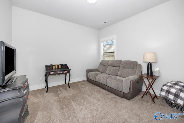 living room featuring light colored carpet