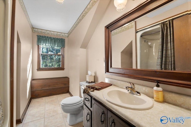 19660 Cox Rd, Athens, AL 35611 - bathroom with tile patterned flooring, vanity, baseboards, and toilet