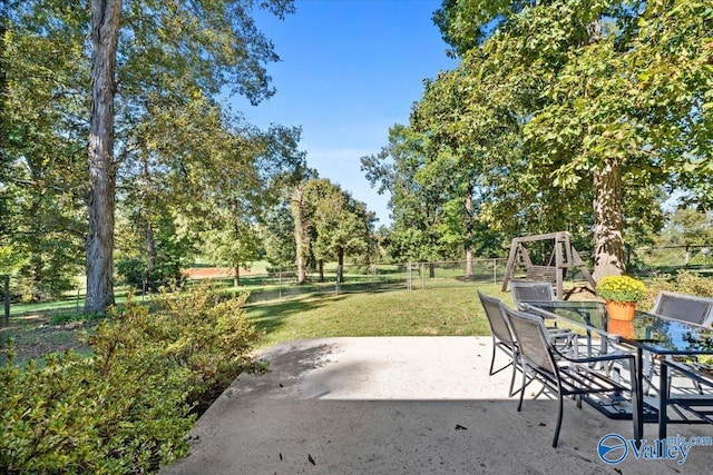 19660 Cox Rd, Athens, AL 35611 - view of patio with fence and outdoor dining area