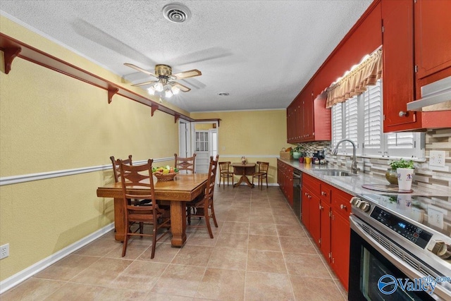 19660 Cox Rd, Athens, AL 35611 - kitchen with stainless steel electric range, a textured ceiling, backsplash, a ceiling fan, and a sink