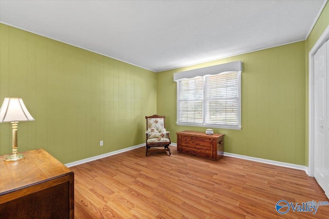 19660 Cox Rd, Athens, AL 35611 - living area with wood finished floors, baseboards, and ornamental molding