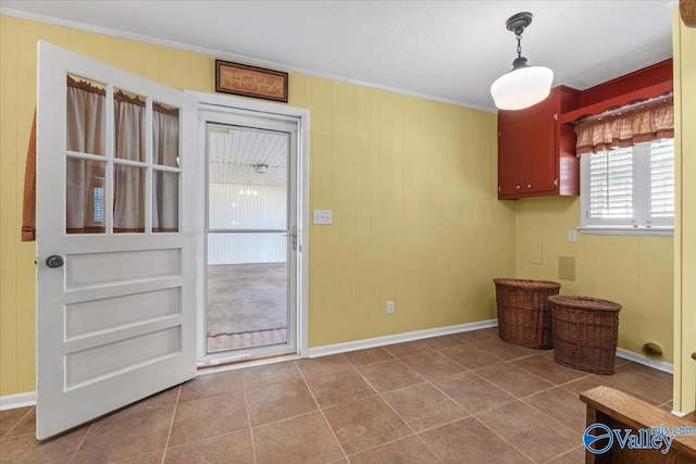 19660 Cox Rd, Athens, AL 35611 - unfurnished dining area featuring baseboards, ornamental molding, and tile patterned flooring