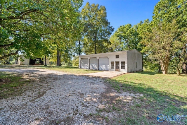 19660 Cox Rd, Athens, AL 35611 - view of pole building featuring a yard