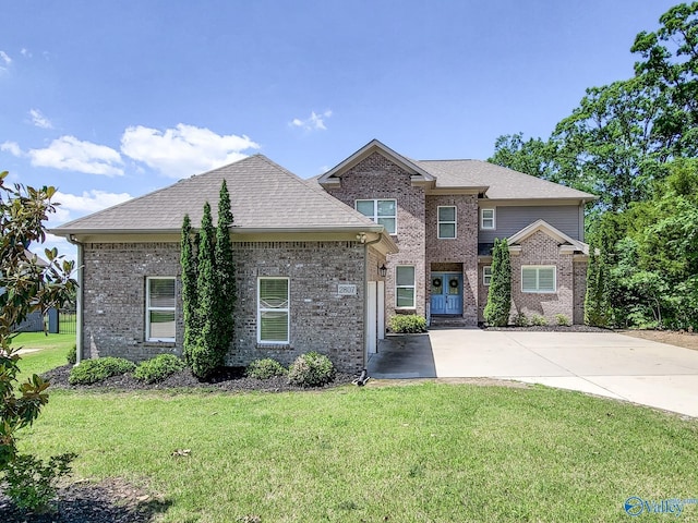 view of property featuring a front yard