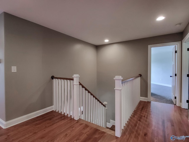 stairway with wood-type flooring