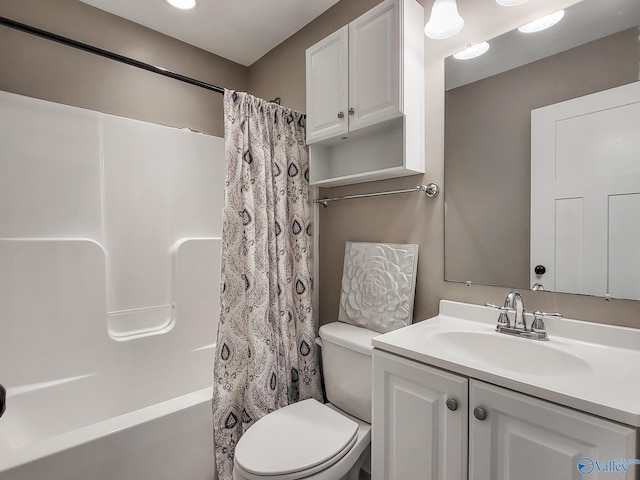 full bathroom with vanity, toilet, and shower / bathtub combination with curtain