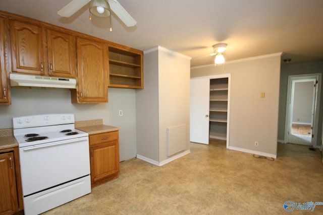 kitchen featuring electric range, light colored carpet, ceiling fan, and crown molding