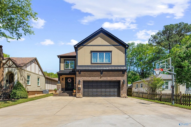 2603 Whitesburg Dr, Huntsville, AL 35801 - view of front of house with central air condition unit, driveway, fence, a garage, and brick siding