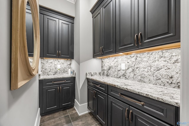 2603 Whitesburg Dr, Huntsville, AL 35801 - clothes washing area featuring cabinet space and baseboards