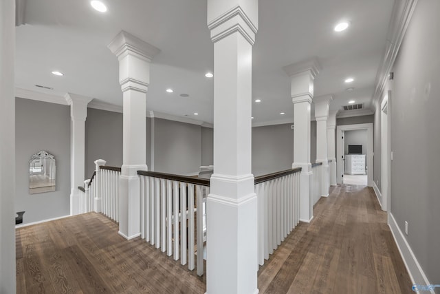2603 Whitesburg Dr, Huntsville, AL 35801 - corridor featuring crown molding, wood finished floors, an upstairs landing, and visible vents