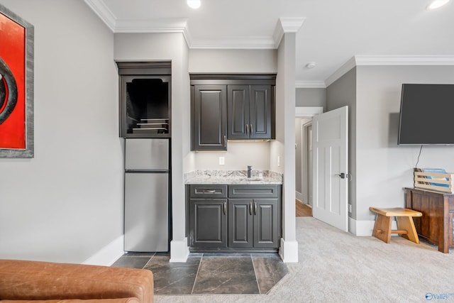 2603 Whitesburg Dr, Huntsville, AL 35801 - kitchen with baseboards, freestanding refrigerator, recessed lighting, and crown molding