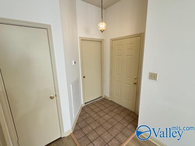 view of tiled foyer entrance