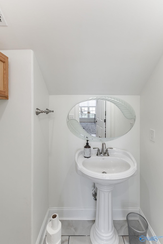 bathroom featuring tile patterned flooring