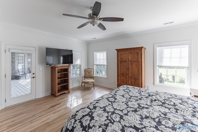 bedroom featuring ceiling fan, light wood-type flooring, ornamental molding, and access to outside