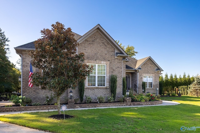 view of front of home with a front lawn