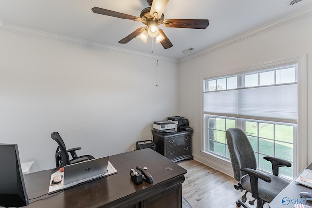 home office featuring ornamental molding, light hardwood / wood-style flooring, and ceiling fan