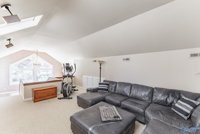 living area with light carpet, lofted ceiling with skylight, baseboards, and visible vents