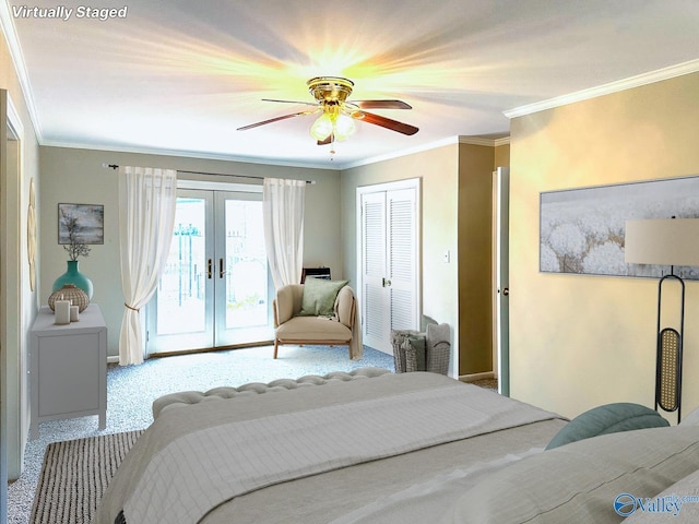 bedroom with french doors, access to exterior, crown molding, carpet flooring, and a closet