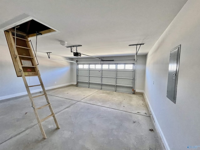 garage featuring electric panel, baseboards, and a garage door opener