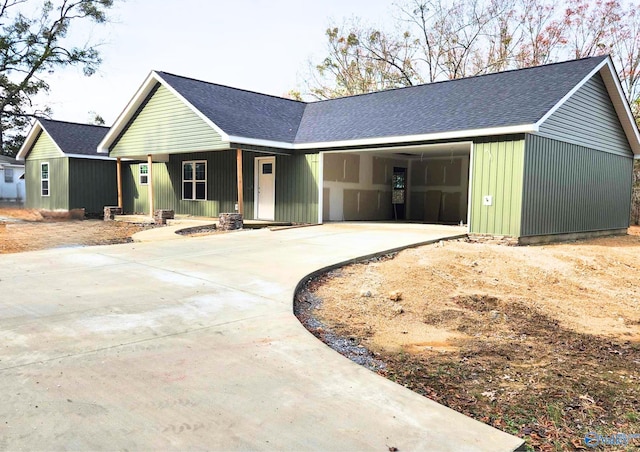 single story home featuring a garage