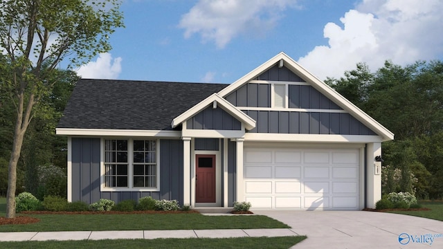 view of front of home with a garage and a front lawn