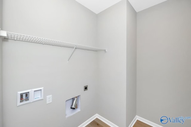 laundry room featuring hookup for a washing machine, hookup for an electric dryer, and hardwood / wood-style flooring