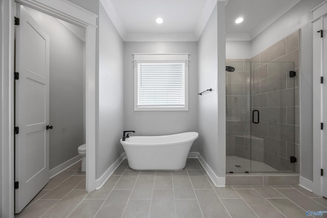 bathroom featuring tile patterned flooring, plus walk in shower, and toilet