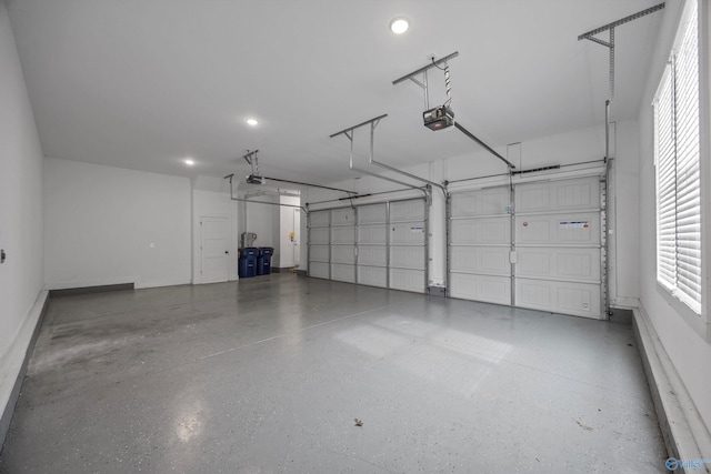 garage featuring a garage door opener