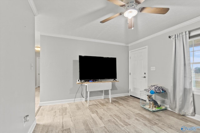 unfurnished living room with hardwood / wood-style flooring, ceiling fan, and ornamental molding