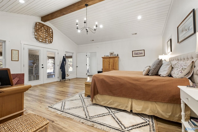 bedroom featuring french doors, a notable chandelier, vaulted ceiling with beams, light wood-style floors, and access to outside