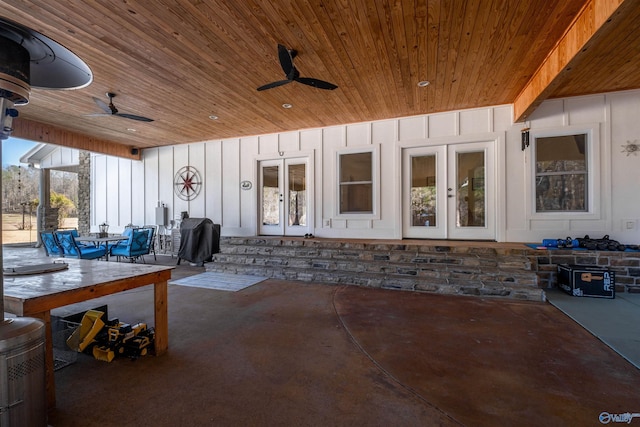 view of patio featuring ceiling fan, french doors, outdoor dining space, and a grill