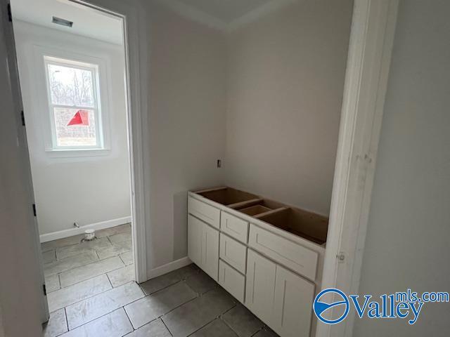 bathroom with tile patterned flooring