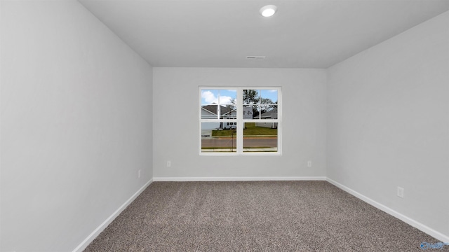 spare room featuring carpet flooring