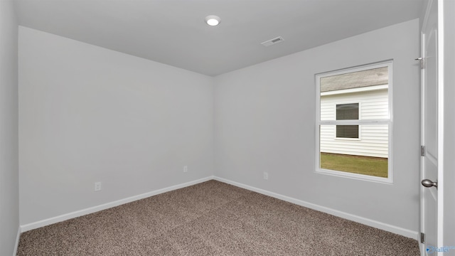 view of carpeted spare room