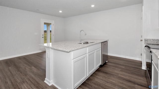 kitchen with sink, white cabinetry, a center island with sink, stainless steel dishwasher, and light stone countertops