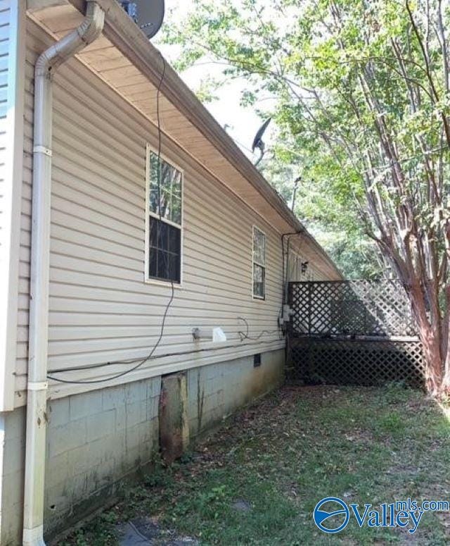 1607 Tennessee St, Sheffield, AL 35660 - view of home's exterior featuring crawl space
