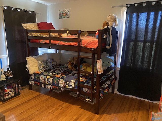 bedroom featuring hardwood / wood-style floors