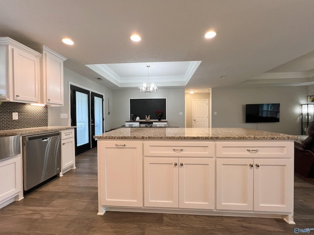 1575 Cottage Ln, Southside, AL 35907 - kitchen featuring dishwasher, open floor plan, a raised ceiling, ornamental molding, and white cabinetry