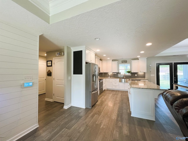 1575 Cottage Ln, Southside, AL 35907 - kitchen featuring appliances with stainless steel finishes, dark wood-style floors, a sink, recessed lighting, and light stone countertops