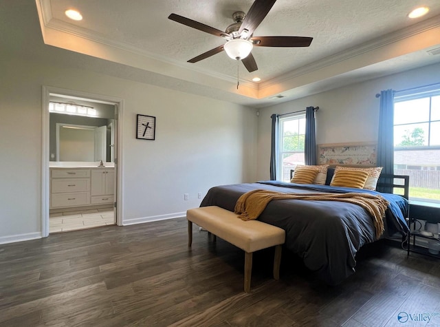 1575 Cottage Ln, Southside, AL 35907 - bedroom featuring a raised ceiling, crown molding, wood finished floors, ensuite bath, and baseboards